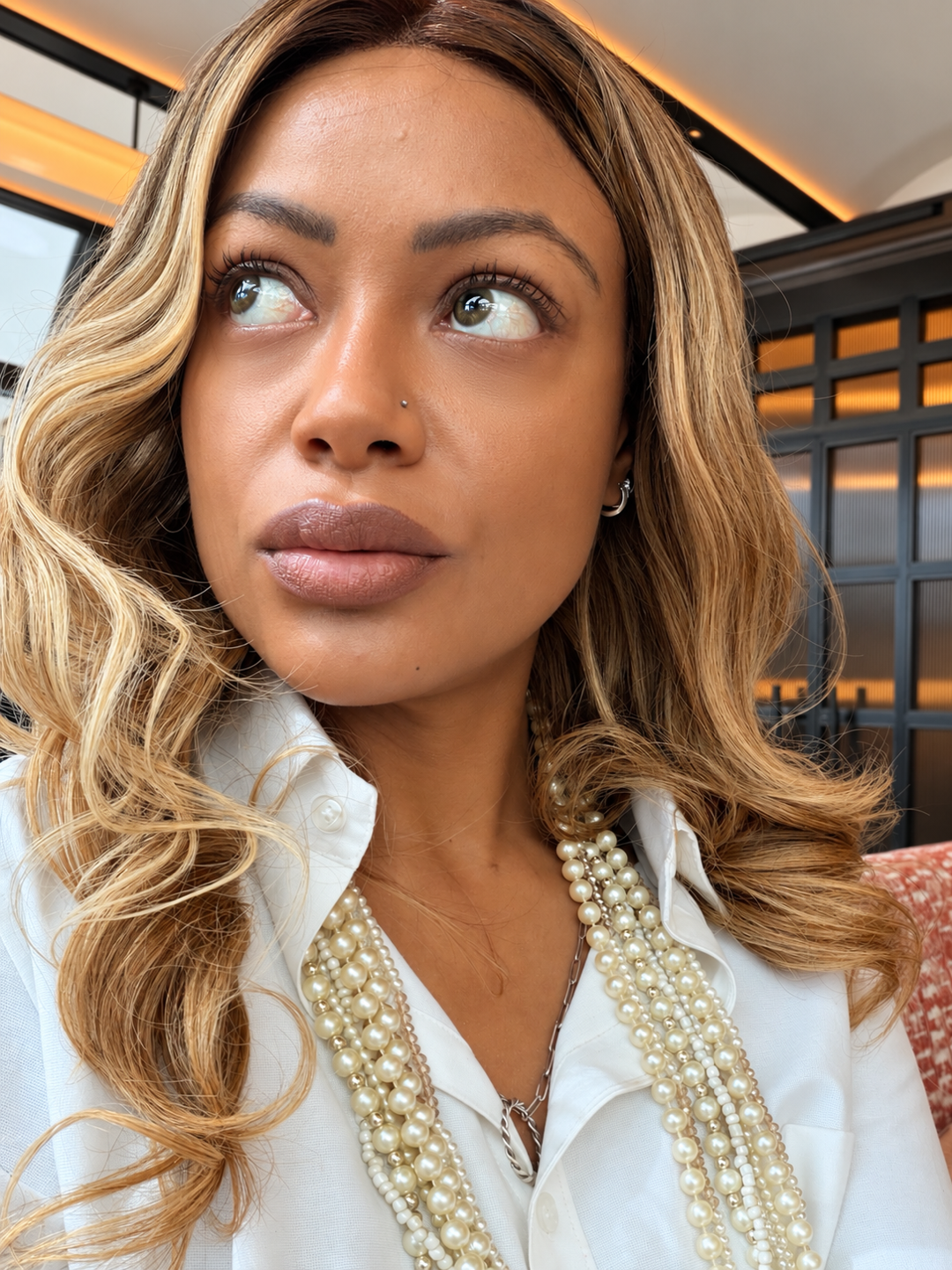 Pearls and white shirt at Café Boulud